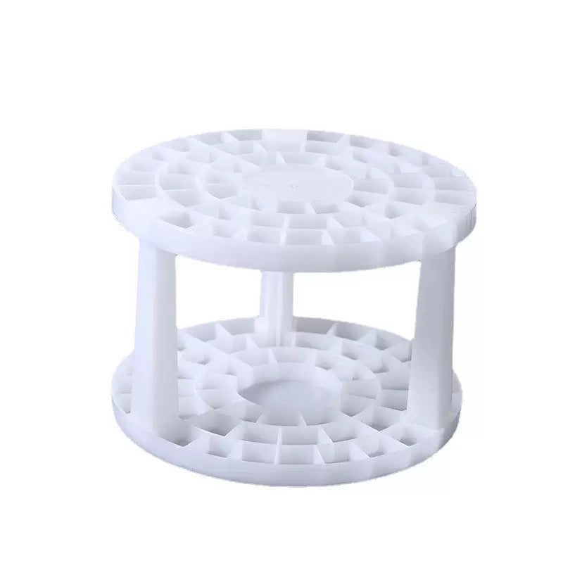 The round brush stand on a desk