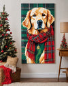 Painted portrait of a golden retriever in a red tartan scarf hanging next to a Christmas tree