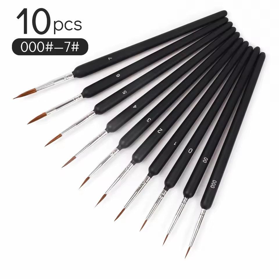 Ten black-handled liner brushes laid out in a row, sizes 000 to 7