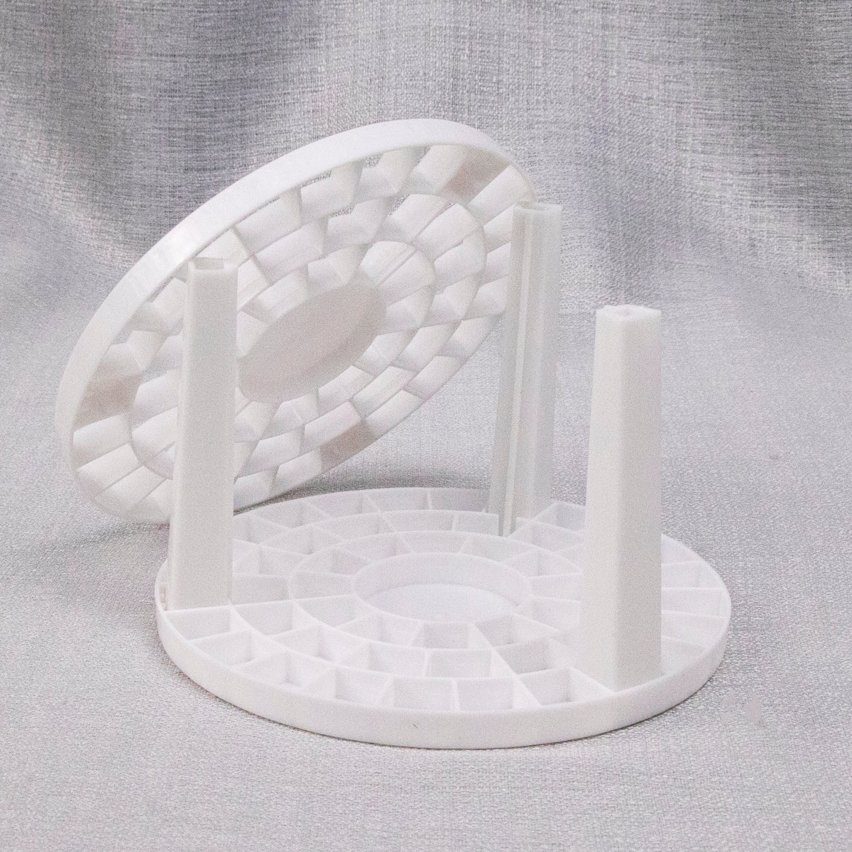 The empty round brush stand