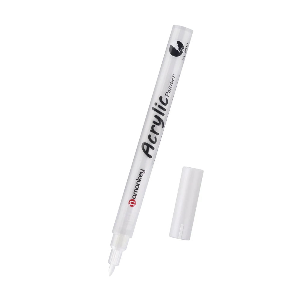 White acrylic paint marker with a fine brush nib