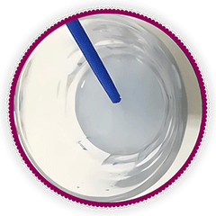 A paint by numbers brush being rinsed in a cup of water