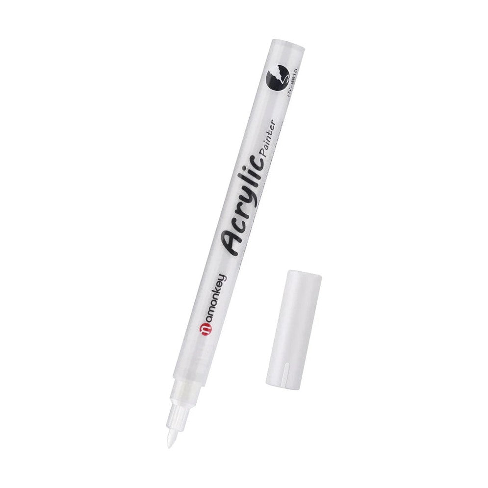 White acrylic paint marker with its cap off