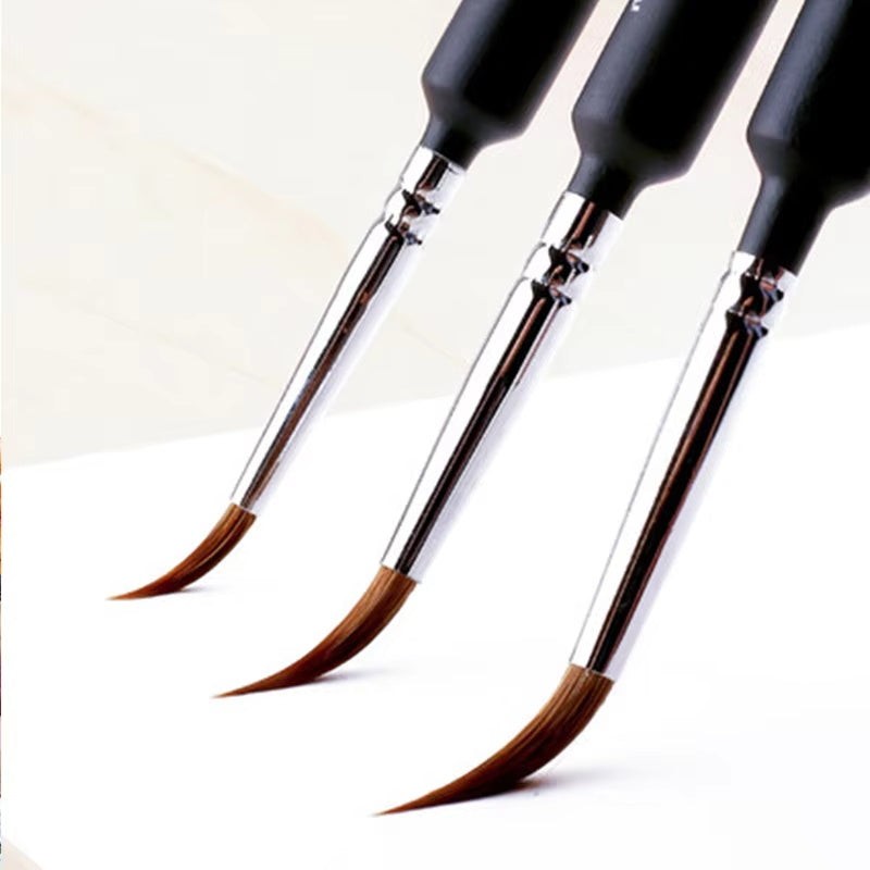 Close-up of three fine liner tips