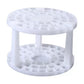 The empty round brush stand, two tiers of holes