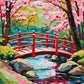 Cherry Blossom Bridge paint by numbers kit, red bridge surrounded by pink cherry blossoms