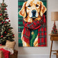 Painted portrait of a golden retriever in a red tartan scarf hanging next to a Christmas tree