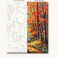 Sunlit Autumn Forest Path numbered canvas next to the finished painting